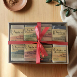 Coffret de savons naturels Argilarii avec ruban rouge.